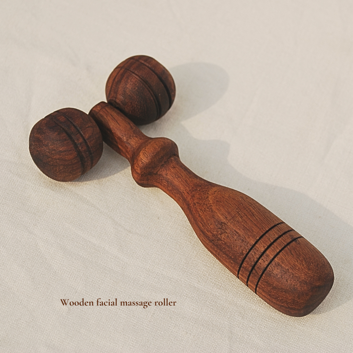 Wooden facial massage roller